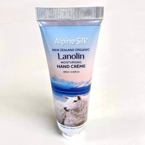 Hand and Nail creme bottle. 30ml. Blue and white bottle.