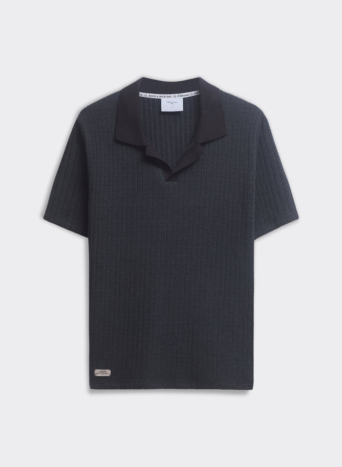 The black Percival Anthony Ribbed Polo, a knitted cotton-blend shirt with an open collar, shown flat on a plain background.