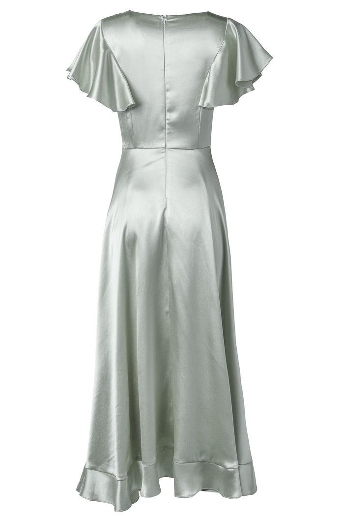 The Callie Dress in Sage Satin by Ivy City Co features a pale green satin finish, short flutter sleeves, and a flared hem. Shown from the back, this midi dress highlights a fitted waist and a visible zipper—making it an ideal choice for a sage satin bridesmaid dress.