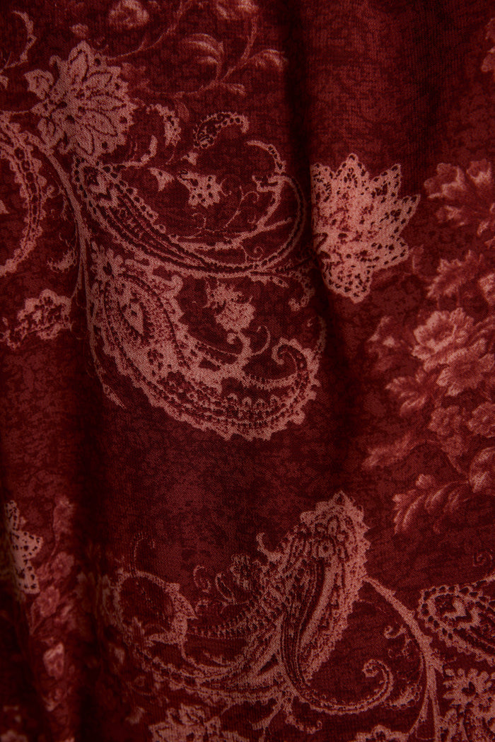 Close-up of mulberry paisley print fabric on the Mariana boho mini dress.