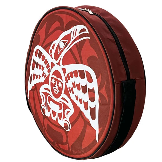 Round red bag with white bird design on a white background