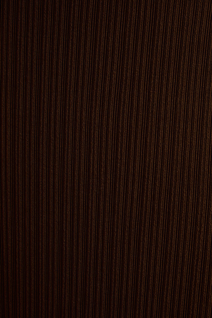 Close-up of the ribbed mocha fabric texture on the Yvette halter maxi dress.