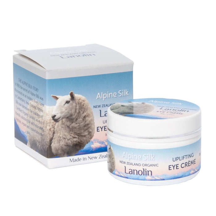White 30gr pot of eye creme. Next to blue and white box packaging.