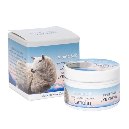 White 30gr pot of eye creme. Next to blue and white box packaging.