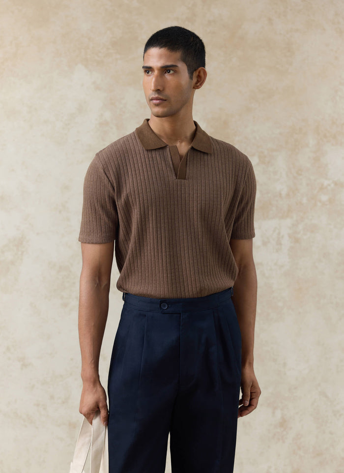Percival espresso brown Anthony Ribbed Polo and navy cotton Blake Double Pleated Trousers on a model.