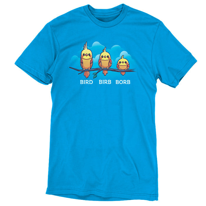 Premium Cotton T-shirt_Teeturtle Bird. Birb. Borb. cobalt blue t-shirt featuring three cartoon birds with varying levels of fluffiness sit on a branch against a blue background with clouds. The birds are labeled "Bird," "Birb," and "Borb" from left to right, adding a playful twist to their names, showcasing the Bird.