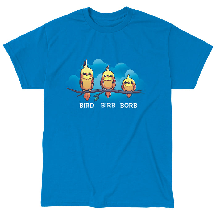 Classic Cotton T-shirt_Teeturtle Bird. Birb. Borb. sapphire blue t-shirt featuring three cartoon birds with varying levels of fluffiness sit on a branch against a blue background with clouds. The birds are labeled "Bird," "Birb," and "Borb" from left to right, adding a playful twist to their names, showcasing the Bird.