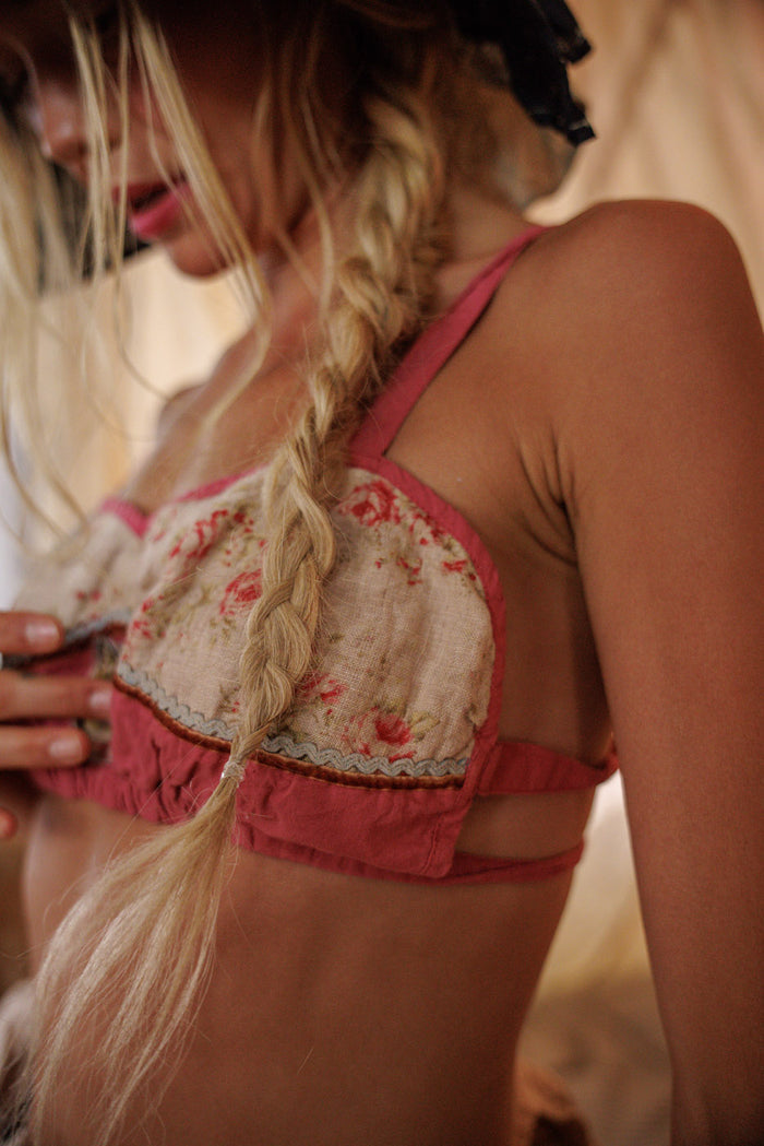 Woman in Magnolia Pearl artisan floral vintage bralette, whimsical boho niche fashion style