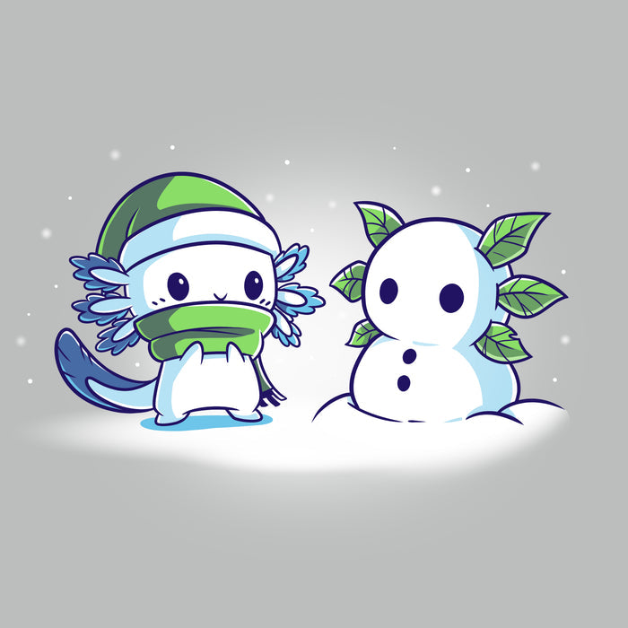 Premium Cotton T-shirt_TeeTurtle Frosty Friend A cute, blue cartoon creature with a green hat and scarf stands next to its Frosty Friend, a snowman with leaf arms, in a snowy setting.
