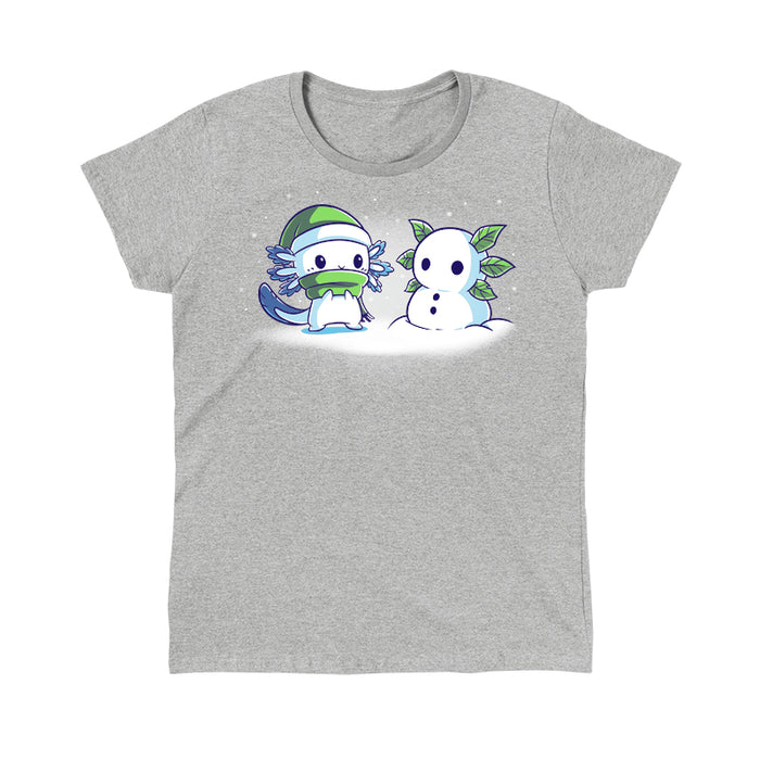 Classic Cotton T-shirt_TeeTurtle Frosty Friend A cute, blue cartoon creature with a green hat and scarf stands next to its Frosty Friend, a snowman with leaf arms, in a snowy setting.
