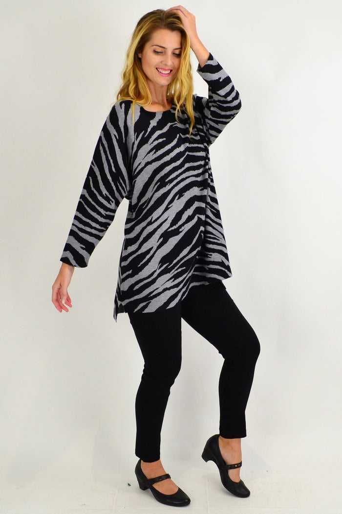 Grey zebra wool blend tunic jumper by Cali&Co, featuring a cozy, stylish design with a relaxed fit and zebra pattern.
