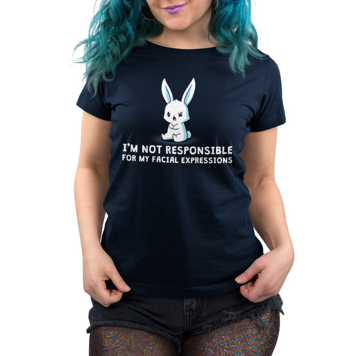 Premium Cotton T-shirt_TeeTurtle navy blue Facial Expressions apparel featuring a cartoon bunny with a grumpy face sits with crossed arms, text below reads "I'M NOT RESPONSIBLE FOR MY FACIAL EXPRESSIONS."