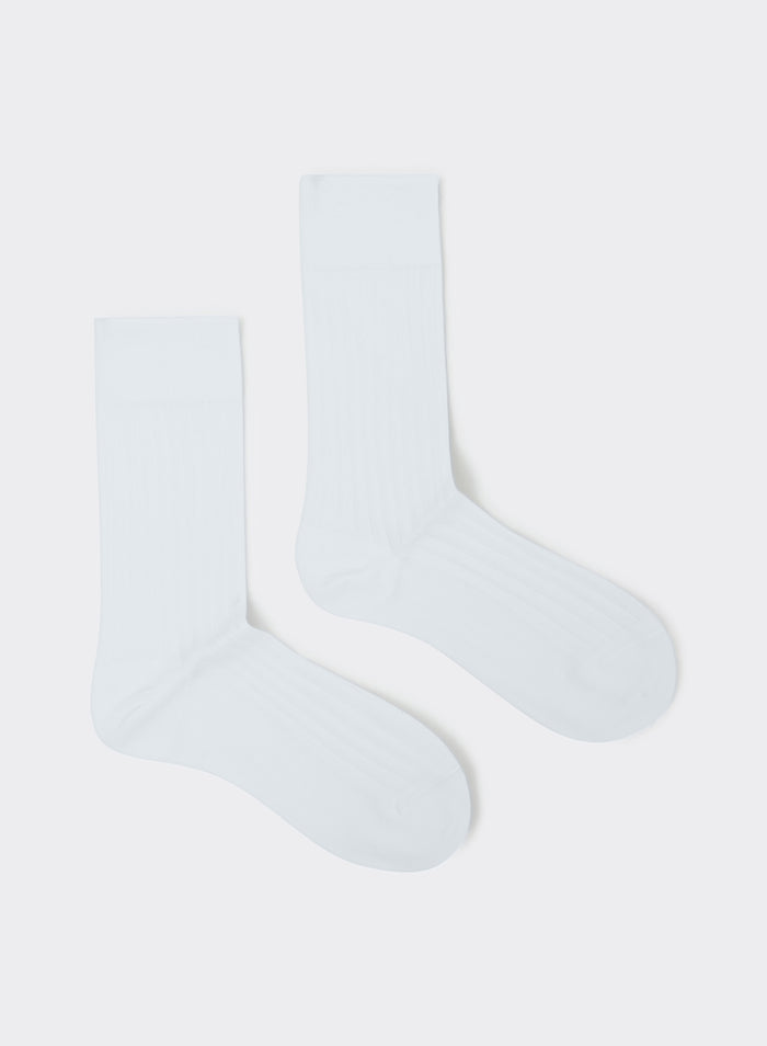 Percival white cotton loafer dress socks with a fine ribbed texture, shown flat on a white background.