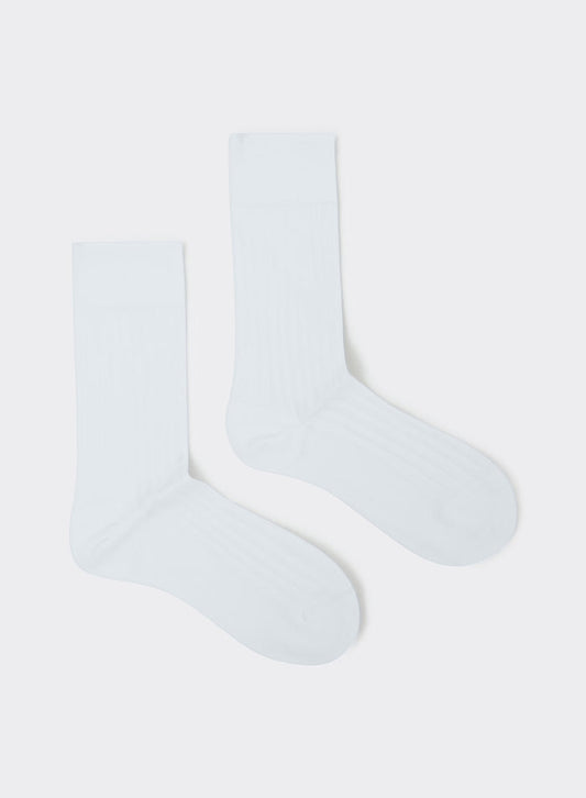 Percival white cotton loafer dress socks with a fine ribbed texture, shown flat on a white background.