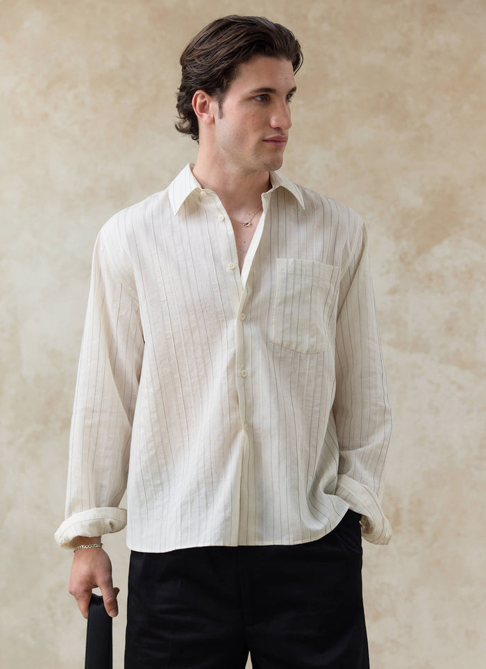 The Percival Lorenzo Pearce Shirt in cream stripe, a lyocell blend button-up with a point collar and chest pocket.