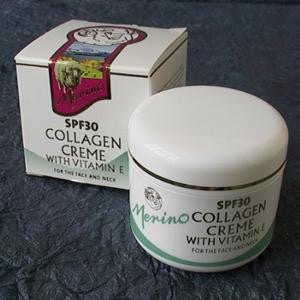 Merino Lanolin and Collagen SPF30 Crème with branding on a blanket next to packaging box.