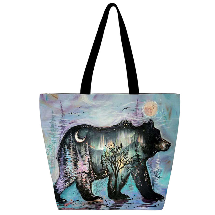 Tote bag with bear design in a forest scene on a white background