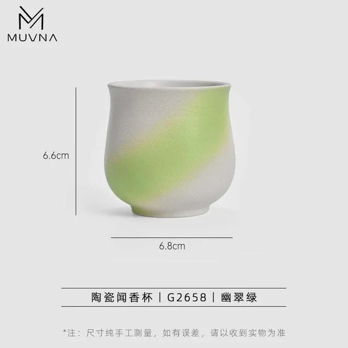 The ceramic fragrance cup is emerald green
