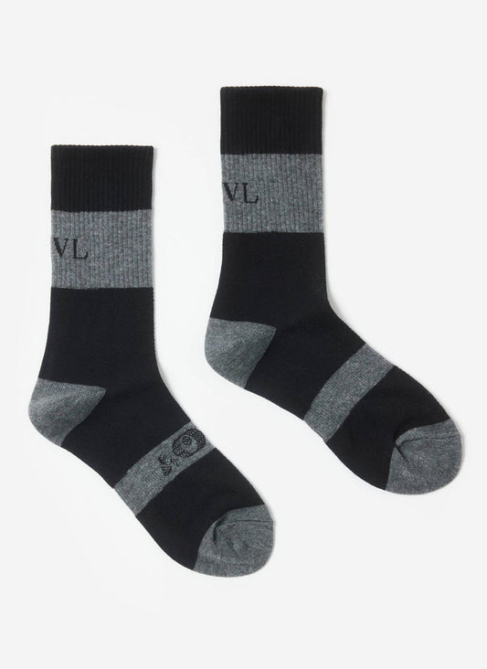 A pair of the Percival PCVL Performance Socks in black and grey, laid flat against a clean white background.