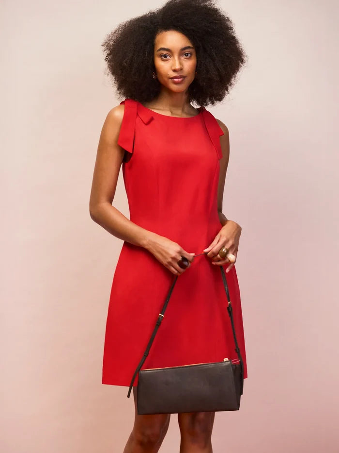 Red linen blend mini dress with shoulder tie detail front view