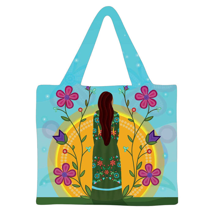 Tote bag with a colorful design of a woman and flowers on a blue background