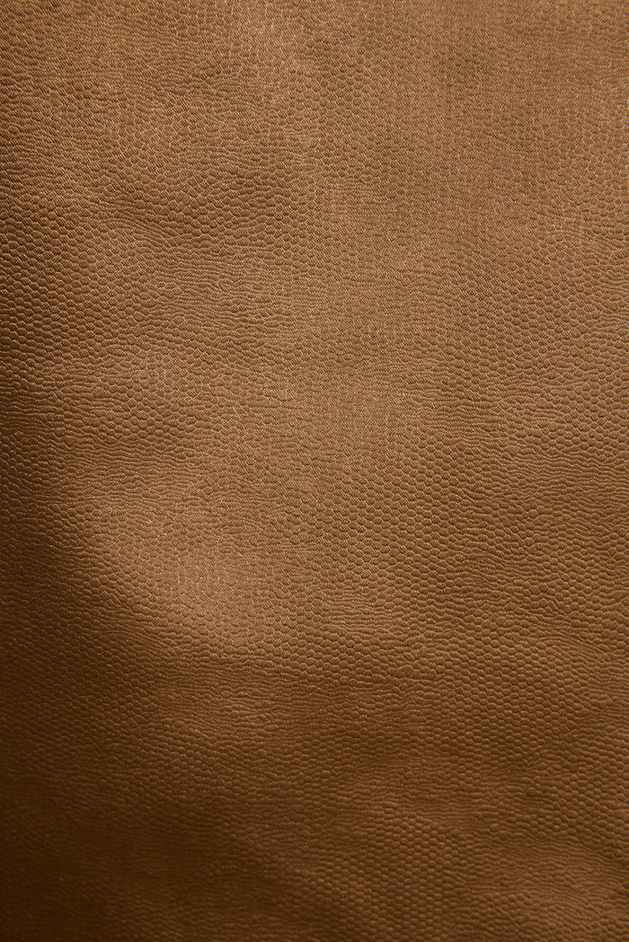 Close-up of pebbled bronze satin fabric used in the Sienna Coast halter top.