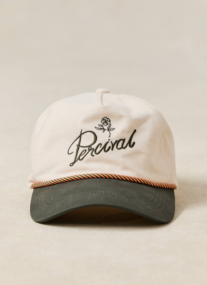 Percival Spencer trucker cap in cream brushed cotton with a dark brim, script embroidery, and pop of colour rope detailing.