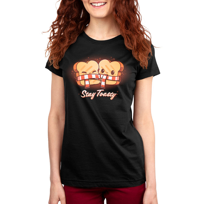 Premium Cotton T-shirt_Teeturtle Stay Toasty black t-shirt featuring two smiling pieces of toast, bundled together with a red and white striped scarf. The text "Stay Toasty" is written below.