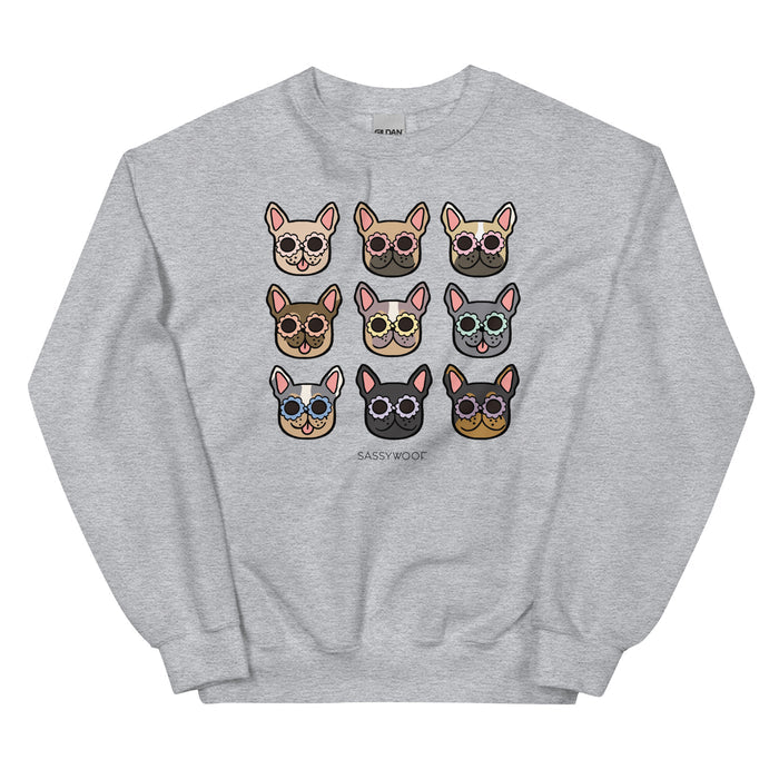 The Sassy Woof Sweatshirt - Frenchies features a gray unisex crewneck with a 3x3 grid of illustrated French bulldog faces in sunglasses, "SASSY WOOF" printed below. A must-have addition to any dog lover's apparel collection.