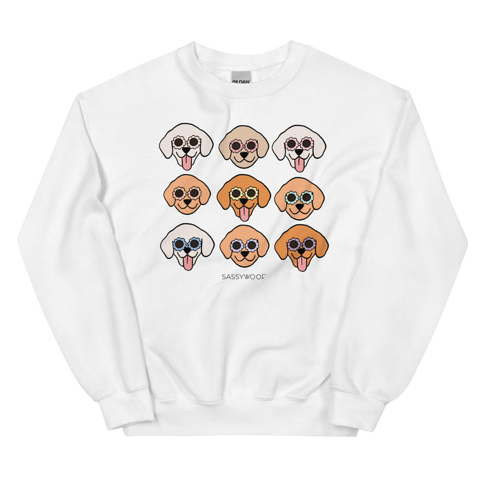 The Sassy Woof Sweatshirt - Goldens is a comfy unisex cotton blend featuring nine cartoon Golden dog faces in sunglasses, with brown, tan, and white fur. “SASSY WOOF” is printed beneath the grid of smiling pups.