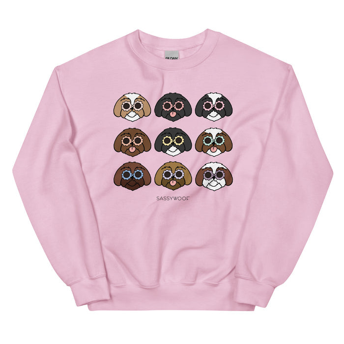 The Sweatshirt - Shih Tzus by Sassy Woof is a pink unisex top featuring cartoon Shih Tzu faces in sunglasses over three rows with “SASSY WOOF” below—an ideal playful gift for any dog lover.