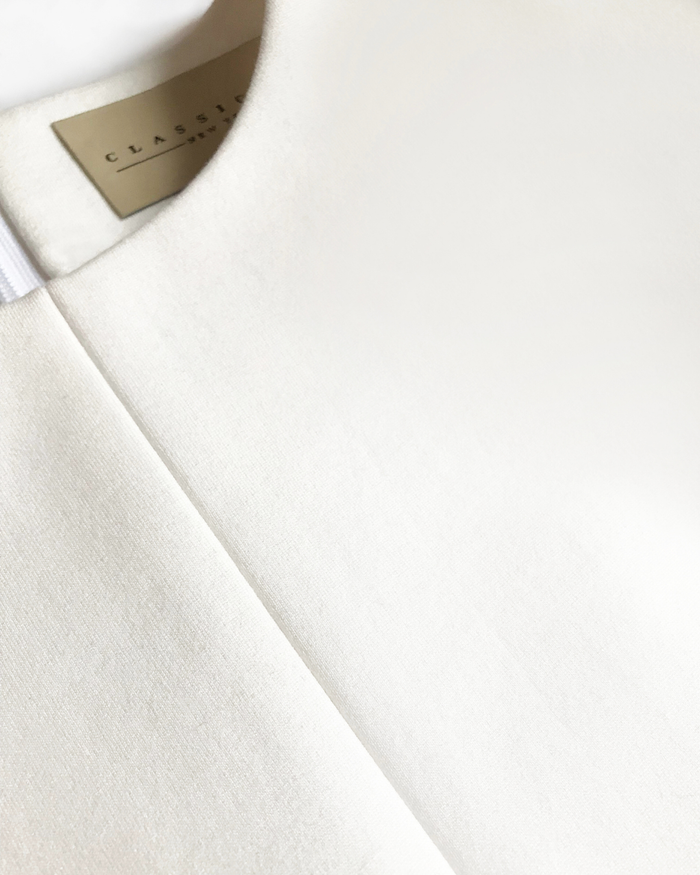 Twiggy Sleeveless Shift Dress in Ivory