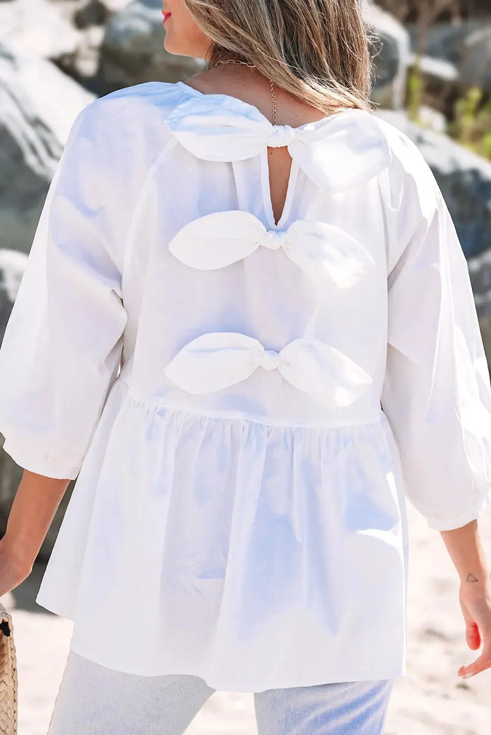 Shop White Bow Knot Cutout Back Loose Fit 3/4 Sleeve Blouse at eAura