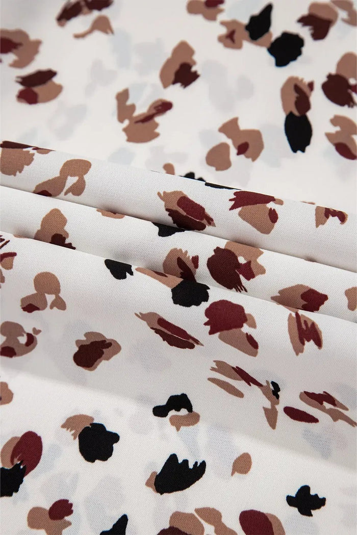 Shop White Leopard Print Lantern Sleeve Mock Neck Pleated Blouse at eAura