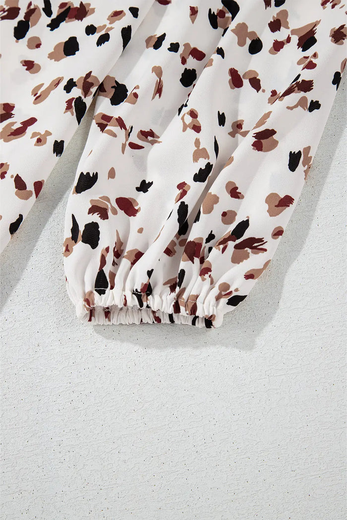 Shop White Leopard Print Lantern Sleeve Mock Neck Pleated Blouse at eAura