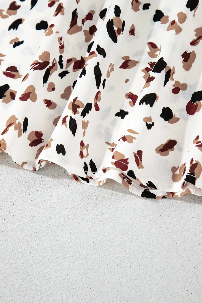 Shop White Leopard Print Lantern Sleeve Mock Neck Pleated Blouse at eAura